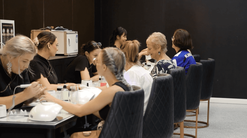 Women of all ages getting their nails done at Sassy Minx